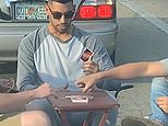 Video: TikTok video shows men playing UNO while waiting in Florida traffic | Daily Mail Online
